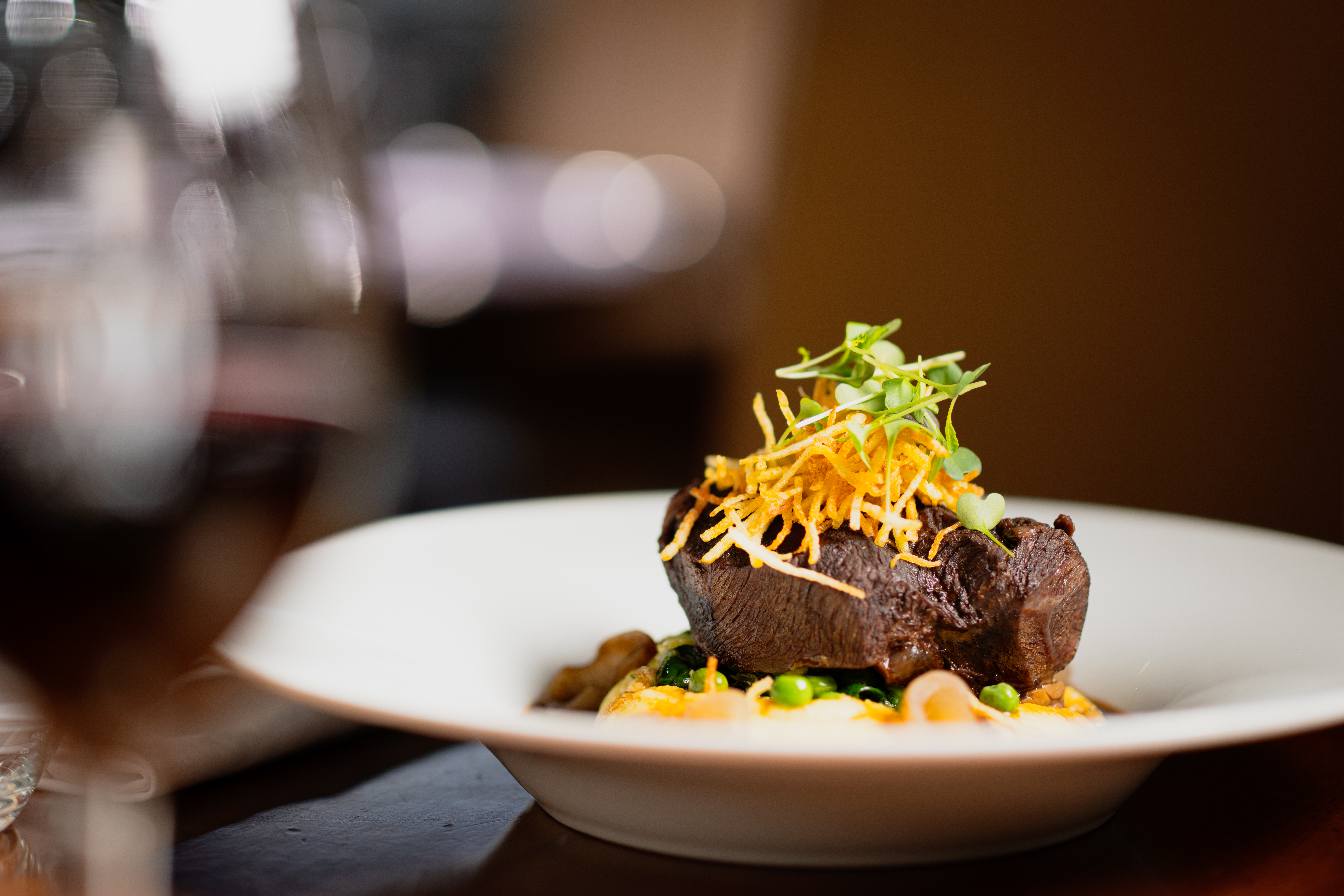 braised beef cheek 43 garlic mash, sautéed greens, balsamic onion, jus, crispy potato
